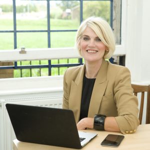 Professional shot of an employee from Lexonik in a house setting. Lexonik is an educational system for the advanced to help them in the future.