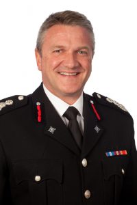 Professional corporate portrait shot of a man from North Yorkshire Fire & Rescue in uniform. Shot by professional northeast corporate photographer Cal Carey.