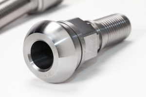 This is a professional advertising shot of a 'bolt' for the company Con Mech Engineering which is based in Annfield Plain, the photo is also in a studio setup.