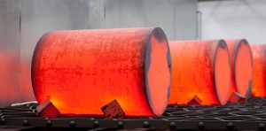Professional industrial photography shot showing visibly red hot barrels at Con Mech. Shot by professional northeast industrial photographer Cal Carey.