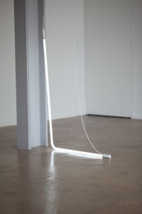 Professional photography of fine art showing a piece of art using a bent light strip. Shot by professional northeast photographer Cal Carey.