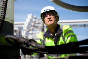 Professional industrial shot of a greenergy worker in high visibility clothing at the petroleum terminal, Seal Sands Industrial Site Hartlepool. Shot by professional northeast industrial photographer Cal Carey.