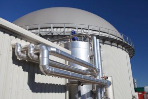 Professional industrial shot of silver pipes at a anaerobic digestion waste to energy site. Shot by professional northeast industrial photographer Cal Carey.