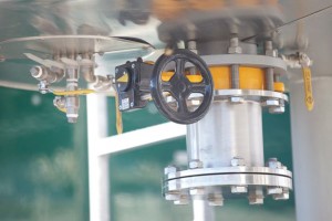 Professional industrial shot which is a close up of valves at a waste to energy facility. Shot by professional northeast industrial photographer Cal Carey.