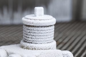 Professional commercial photography shot showing an environmental testing process of what happens when equipment is subjected to extreme conditions of coldness. Shot by professional northeast commercial photographer Cal Carey.