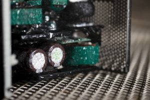 Professional commercial photography shot showing an environmental testing process against circuitry equipment. Shot by professional northeast commercial photographer Cal Carey.