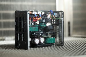 Professional commercial photography shot showing an environmental testing process against circuitry equipment. Shot by professional northeast commercial photographer Cal Carey.