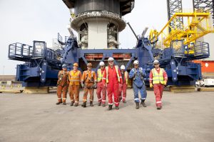 Professional commercial photography shot showing the houlder team in front of the new pile restraint arms at teesport. Shot by professional northeast commercial photographer Cal Carey.