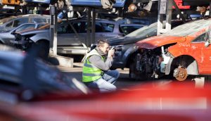 This is a professional shot of Cal Carey, one of Northeast's best photographers behind the scenes shooting for Morgans Auto Salvage.